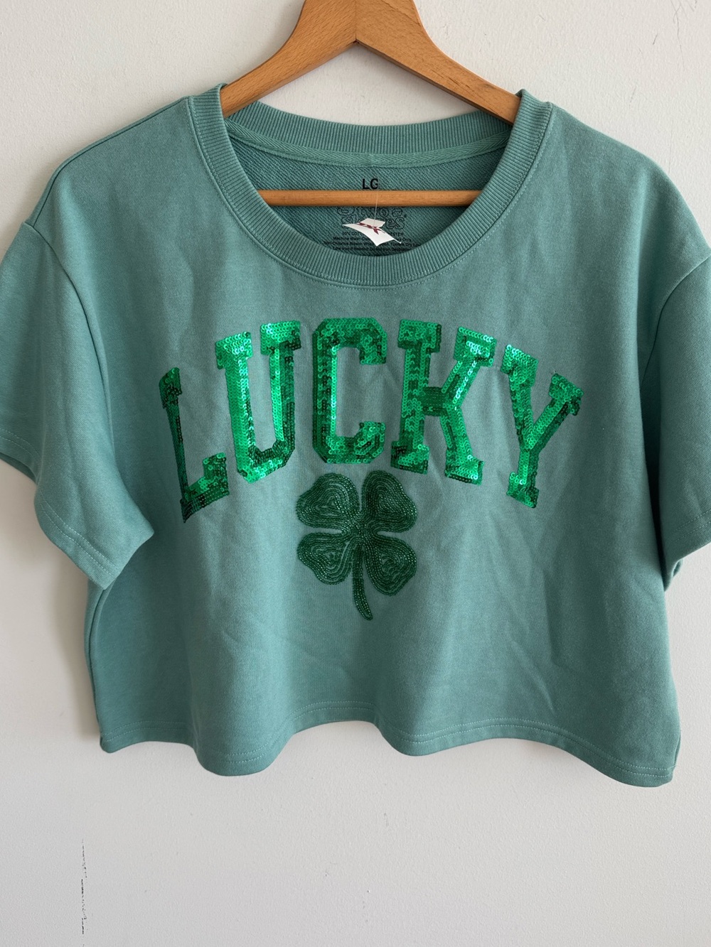 Goodie two sleeve green lucky 4 lead clover sequin short sleeve knit cropped top